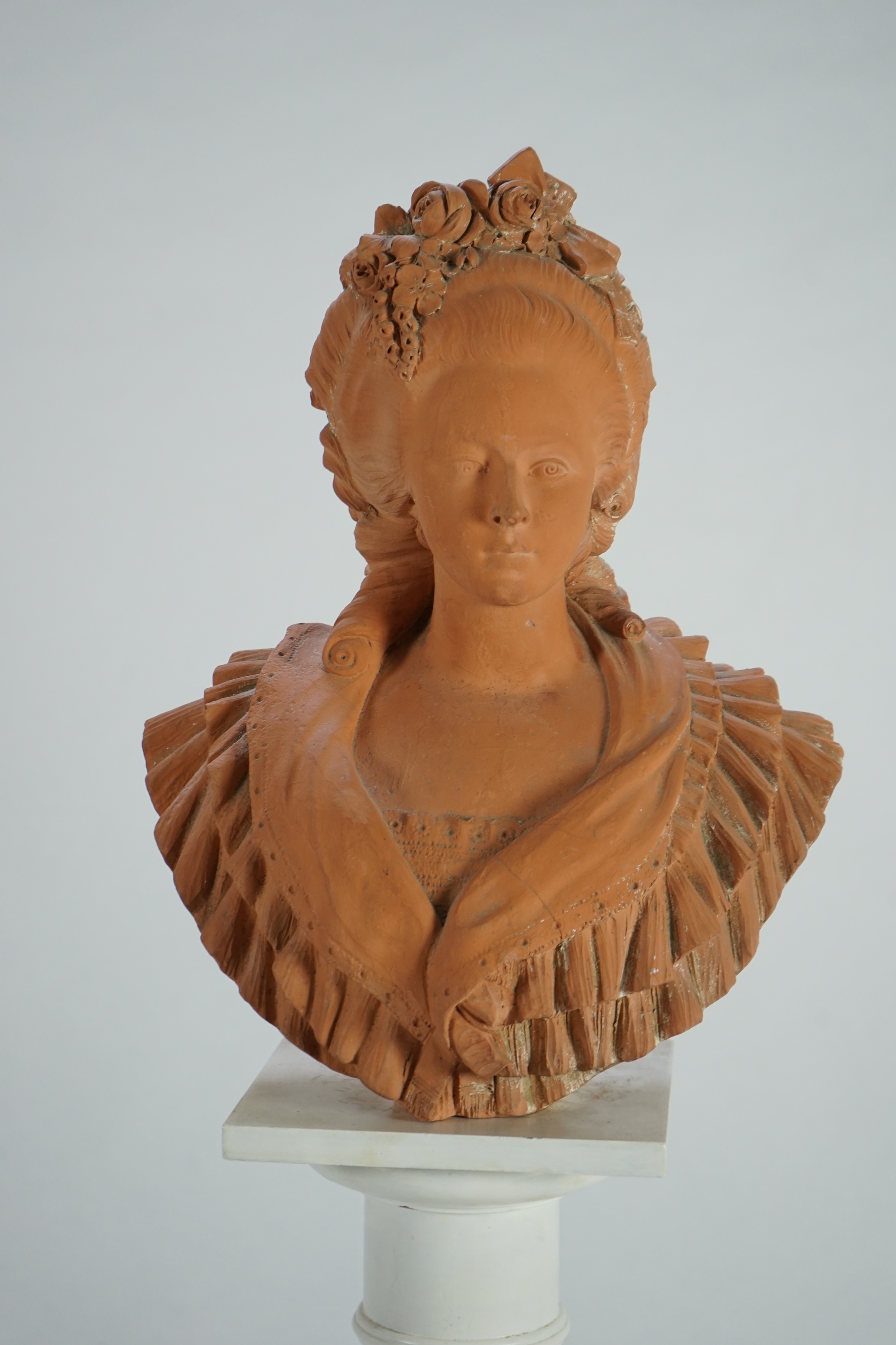 An early 20th century French terracotta bust of Marie Antoinette